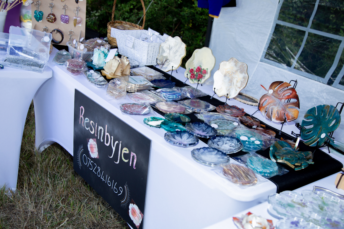 Resinbyjen	stall selling various resin items all handcrafted. Coasters, platters, serving dishes, bowls, some animal & reptile pieces, pendants & rose sprays